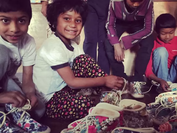 Donating shoes to childrens