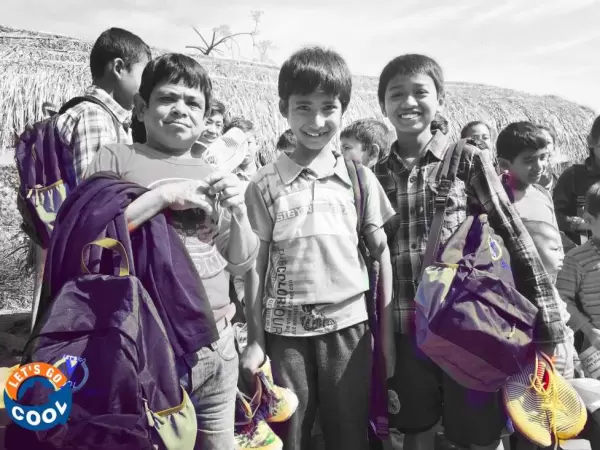 Orphan kids happy receiving cloths and shoes