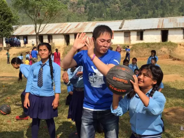 Playing with kids in local school