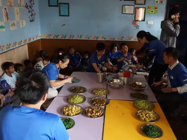 Serving food at homestay